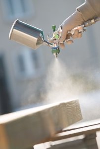 Mold Inhibitor being applied to wood